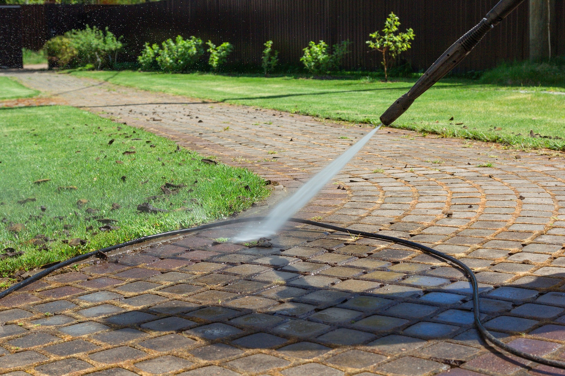 the science behind soft washing vs pressure washing